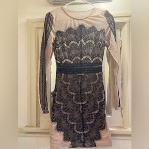 Black lace and sheer nude dress